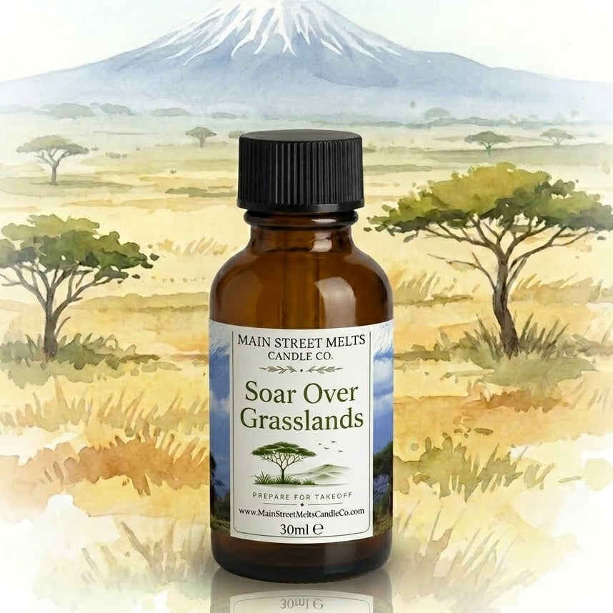 Bottle of 'Soar Over Grasslands' candle oil with a scenic background