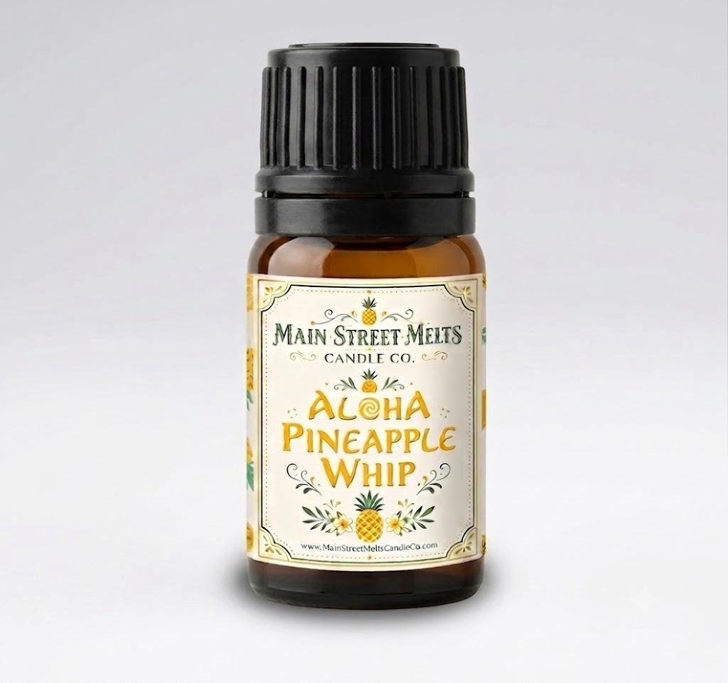 Bottle of Aloha Pineapple Whip fragrance oil with a black cap on a light gray background