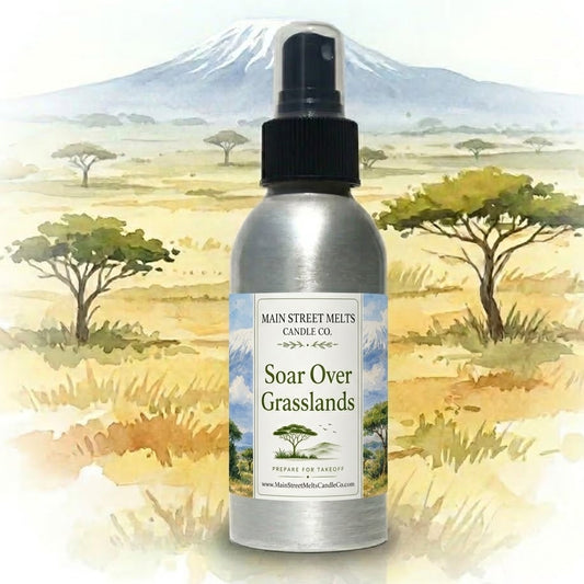 Bottle of 'Soar Over Grasslands' perfume with a scenic background