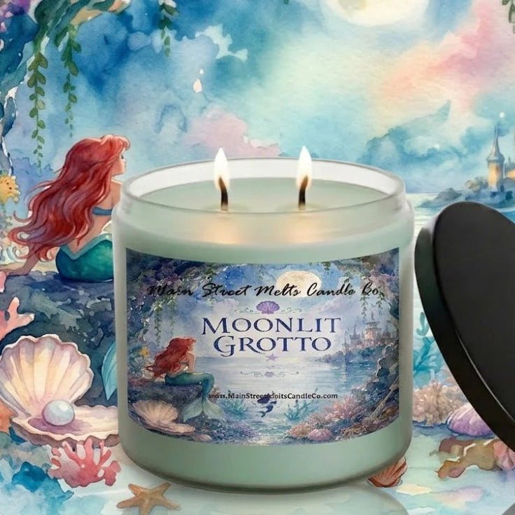 Candle labeled 'Moonlit Grotto' with a mermaid and underwater scene illustration in the background.