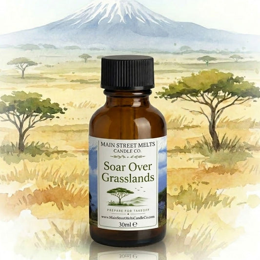Bottle of 'Soar Over Grasslands' candle oil with a scenic background