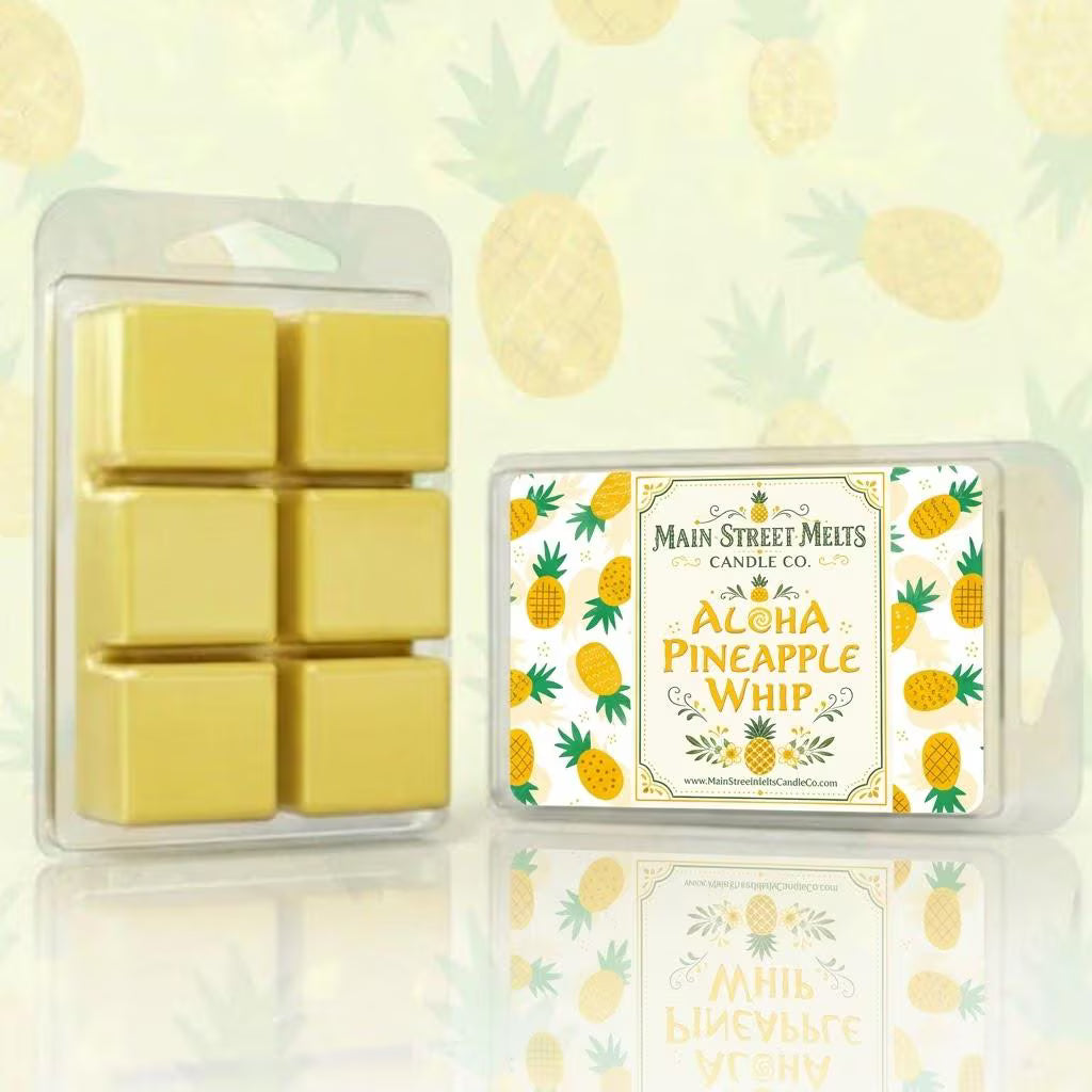 Yellow wax melts in a clear packaging with a pineapple-themed label on a pineapple patterned background.