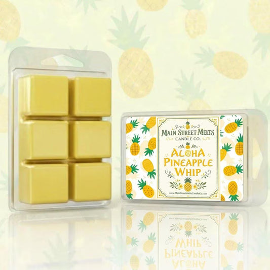 Yellow wax melts in a clear packaging with a pineapple-themed label on a pineapple patterned background.
